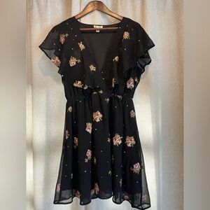 Francesca’s Black Ruffle Embroidered Mini Dress with Deep V Neckline